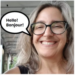 Mug shot of author saying Hello, Bonjour!